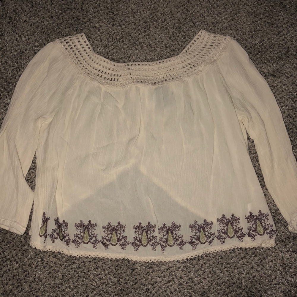 Cream top with purple and green pattern